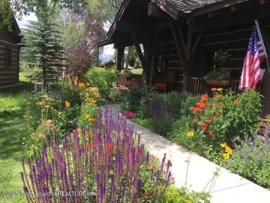 Not your typical Jackson Hole Golf and Tennis cabin! This unique on Jackson Hole Golf and Tennis Club in Wyoming - for sale on GolfHomes.com, golf home, golf lot