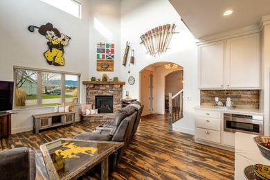 Beautifully upgraded and move-in ready, this two-level paired on The Powder Horn Golf Club - Mountain in Wyoming - for sale on GolfHomes.com, golf home, golf lot