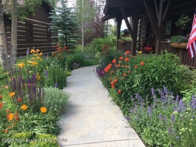 Not your typical Jackson Hole Golf and Tennis cabin! This unique on Jackson Hole Golf and Tennis Club in Wyoming - for sale on GolfHomes.com, golf home, golf lot