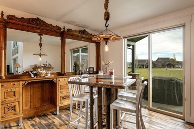 Beautifully upgraded and move-in ready, this two-level paired on The Powder Horn Golf Club - Mountain in Wyoming - for sale on GolfHomes.com, golf home, golf lot