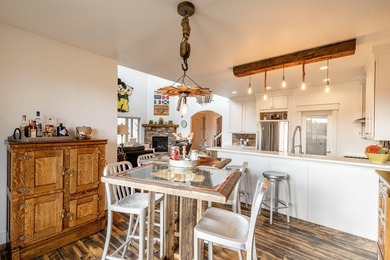 Beautifully upgraded and move-in ready, this two-level paired on The Powder Horn Golf Club - Mountain in Wyoming - for sale on GolfHomes.com, golf home, golf lot