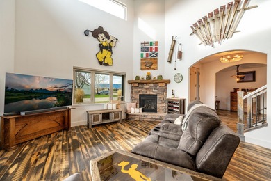 Beautifully upgraded and move-in ready, this two-level paired on The Powder Horn Golf Club - Mountain in Wyoming - for sale on GolfHomes.com, golf home, golf lot