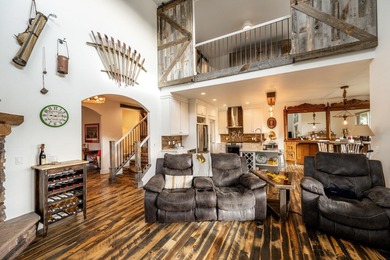 Beautifully upgraded and move-in ready, this two-level paired on The Powder Horn Golf Club - Mountain in Wyoming - for sale on GolfHomes.com, golf home, golf lot