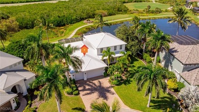 Experience this exquisitely updated spacious lakefront home in on Royal Tee Country Club in Florida - for sale on GolfHomes.com, golf home, golf lot