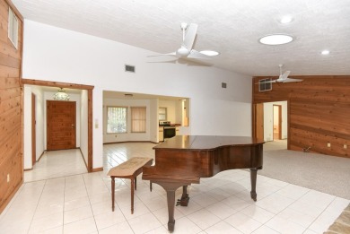 This Pelican Bay Golf Community residence, features a spacious 3 on The Club At Pelican Bay - North Course in Florida - for sale on GolfHomes.com, golf home, golf lot