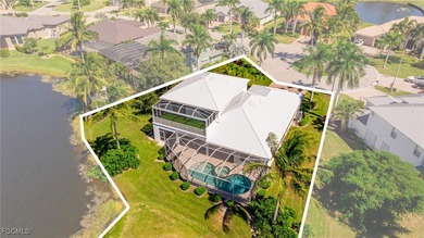 Experience this exquisitely updated spacious lakefront home in on Royal Tee Country Club in Florida - for sale on GolfHomes.com, golf home, golf lot
