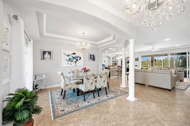 Experience this exquisitely updated spacious lakefront home in on Royal Tee Country Club in Florida - for sale on GolfHomes.com, golf home, golf lot