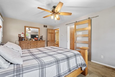 Live where you play!  Nestled on the 14th Fairway on Northwest on Sandy Pines Golf Course in Indiana - for sale on GolfHomes.com, golf home, golf lot