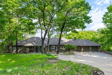 Experience lakeside living at its finest with this custom-built on The Coves Golf Course in Oklahoma - for sale on GolfHomes.com, golf home, golf lot