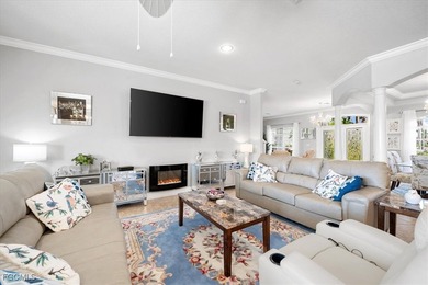 Experience this exquisitely updated spacious lakefront home in on Royal Tee Country Club in Florida - for sale on GolfHomes.com, golf home, golf lot