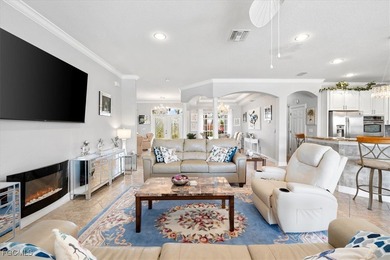 Experience this exquisitely updated spacious lakefront home in on Royal Tee Country Club in Florida - for sale on GolfHomes.com, golf home, golf lot