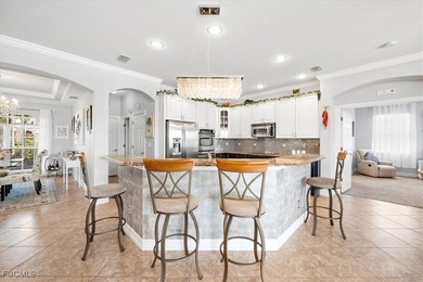 Experience this exquisitely updated spacious lakefront home in on Royal Tee Country Club in Florida - for sale on GolfHomes.com, golf home, golf lot