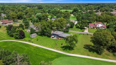 Live where you play!  Nestled on the 14th Fairway on Northwest on Sandy Pines Golf Course in Indiana - for sale on GolfHomes.com, golf home, golf lot