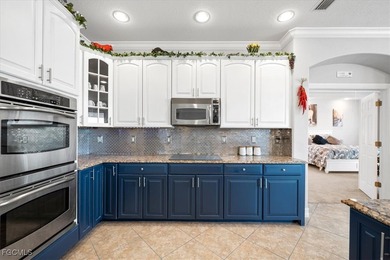 Experience this exquisitely updated spacious lakefront home in on Royal Tee Country Club in Florida - for sale on GolfHomes.com, golf home, golf lot