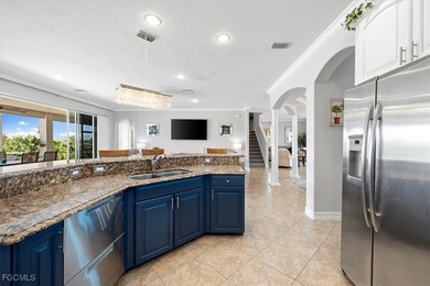 Experience this exquisitely updated spacious lakefront home in on Royal Tee Country Club in Florida - for sale on GolfHomes.com, golf home, golf lot
