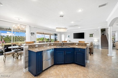 Experience this exquisitely updated spacious lakefront home in on Royal Tee Country Club in Florida - for sale on GolfHomes.com, golf home, golf lot