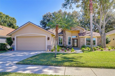 This immaculate, move-in-ready Arvida Laurel model is located on on River Hills Country Club in Florida - for sale on GolfHomes.com, golf home, golf lot
