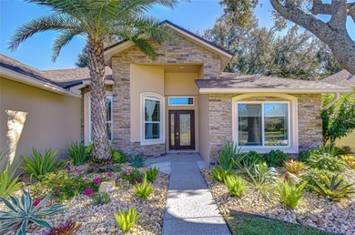 This immaculate, move-in-ready Arvida Laurel model is located on on River Hills Country Club in Florida - for sale on GolfHomes.com, golf home, golf lot