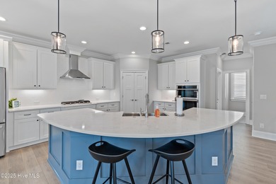 Welcome to easy living in this luxurious Eastwood Bluffs on Sea Trail Golf Resort in North Carolina - for sale on GolfHomes.com, golf home, golf lot