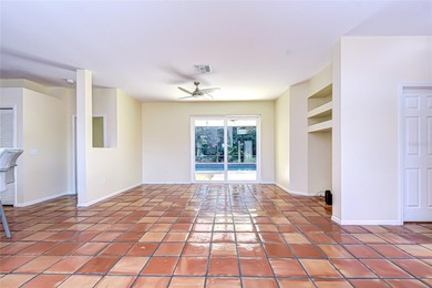 This immaculate, move-in-ready Arvida Laurel model is located on on River Hills Country Club in Florida - for sale on GolfHomes.com, golf home, golf lot