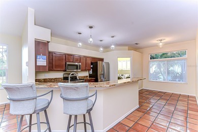 This immaculate, move-in-ready Arvida Laurel model is located on on River Hills Country Club in Florida - for sale on GolfHomes.com, golf home, golf lot