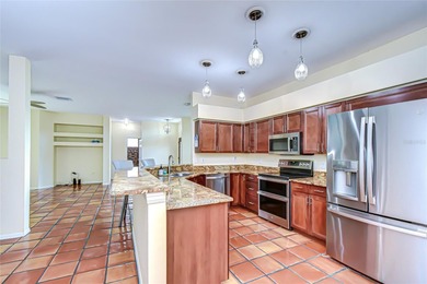 This immaculate, move-in-ready Arvida Laurel model is located on on River Hills Country Club in Florida - for sale on GolfHomes.com, golf home, golf lot