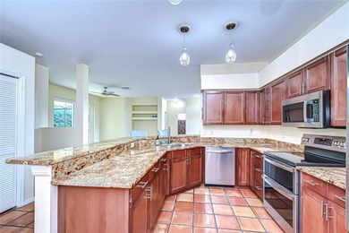 This immaculate, move-in-ready Arvida Laurel model is located on on River Hills Country Club in Florida - for sale on GolfHomes.com, golf home, golf lot