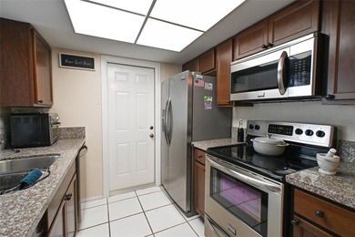 Welcome home to comfort, sunshine, and easy living in on Leisureville Community Association in Florida - for sale on GolfHomes.com, golf home, golf lot