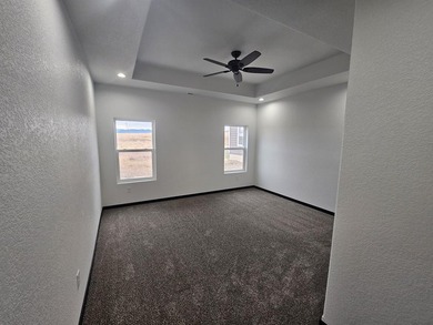 Brand new construction. Located in Hidden Bridge Ranch across on Hidden Bridge Golf Club in Wyoming - for sale on GolfHomes.com, golf home, golf lot