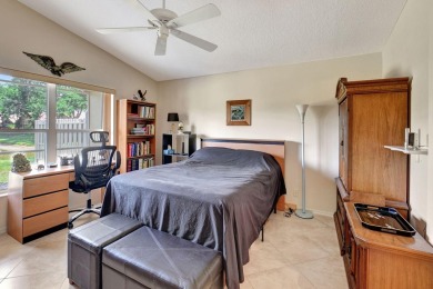 Welcome to this spacious 3-bedroom, 2-bathroom LAKEFRONT home on Westchester Golf and Country Club in Florida - for sale on GolfHomes.com, golf home, golf lot
