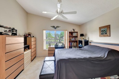 Welcome to this spacious 3-bedroom, 2-bathroom LAKEFRONT home on Westchester Golf and Country Club in Florida - for sale on GolfHomes.com, golf home, golf lot