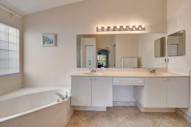 Welcome to this spacious 3-bedroom, 2-bathroom LAKEFRONT home on Westchester Golf and Country Club in Florida - for sale on GolfHomes.com, golf home, golf lot