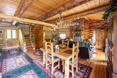 Experience the charm of rustic elegance at 590 Walnut Drive on Star Valley RV Golf Course in Wyoming - for sale on GolfHomes.com, golf home, golf lot