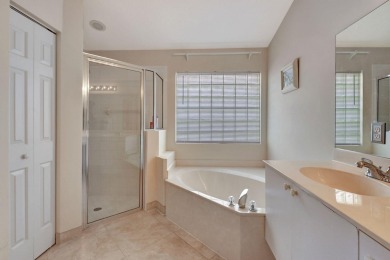 Welcome to this spacious 3-bedroom, 2-bathroom LAKEFRONT home on Westchester Golf and Country Club in Florida - for sale on GolfHomes.com, golf home, golf lot