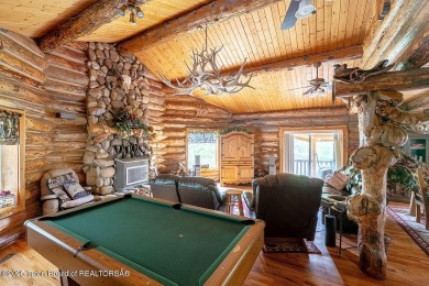 Experience the charm of rustic elegance at 590 Walnut Drive on Star Valley RV Golf Course in Wyoming - for sale on GolfHomes.com, golf home, golf lot