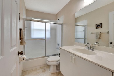 Welcome to this spacious 3-bedroom, 2-bathroom LAKEFRONT home on Westchester Golf and Country Club in Florida - for sale on GolfHomes.com, golf home, golf lot