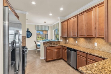 Beautifully furnished, turnkey, second-floor coach home with on The Golf Club At Fiddlers Creek in Florida - for sale on GolfHomes.com, golf home, golf lot