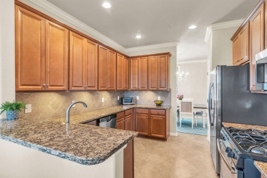 Beautifully furnished, turnkey, second-floor coach home with on The Golf Club At Fiddlers Creek in Florida - for sale on GolfHomes.com, golf home, golf lot