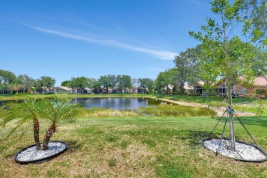 Welcome to this spacious 3-bedroom, 2-bathroom LAKEFRONT home on Westchester Golf and Country Club in Florida - for sale on GolfHomes.com, golf home, golf lot