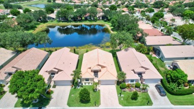 Welcome to this spacious 3-bedroom, 2-bathroom LAKEFRONT home on Westchester Golf and Country Club in Florida - for sale on GolfHomes.com, golf home, golf lot