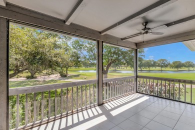 LIVE THE BOCA WEST LIFESTYLE. Second Floor garden apartment with on Boca West Golf and Country Club in Florida - for sale on GolfHomes.com, golf home, golf lot