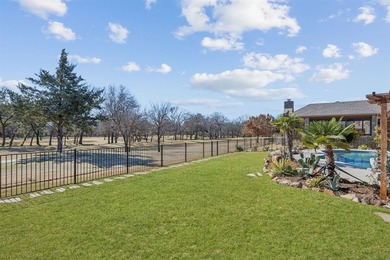 Located in the 24-7 gated and guarded community The Resort, the on The Golf Club at Resort Eagle Mountain Lake in Texas - for sale on GolfHomes.com, golf home, golf lot