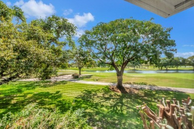 LIVE THE BOCA WEST LIFESTYLE. Second Floor garden apartment with on Boca West Golf and Country Club in Florida - for sale on GolfHomes.com, golf home, golf lot