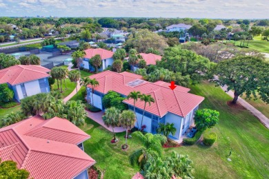 LIVE THE BOCA WEST LIFESTYLE. Second Floor garden apartment with on Boca West Golf and Country Club in Florida - for sale on GolfHomes.com, golf home, golf lot