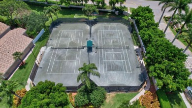 Welcome to this spacious 3-bedroom, 2-bathroom LAKEFRONT home on Westchester Golf and Country Club in Florida - for sale on GolfHomes.com, golf home, golf lot