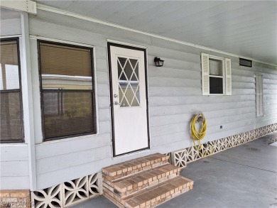 PRICE JUST REDUCED $15,000 - THIS OPEN CONCEPT FLOOR PLAN 1989 on Six Lakes Country Club in Florida - for sale on GolfHomes.com, golf home, golf lot