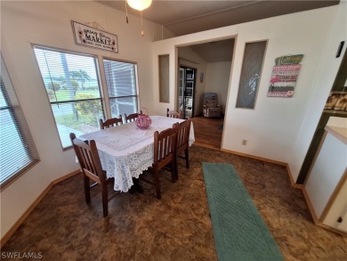 PRICE JUST REDUCED $15,000 - THIS OPEN CONCEPT FLOOR PLAN 1989 on Six Lakes Country Club in Florida - for sale on GolfHomes.com, golf home, golf lot