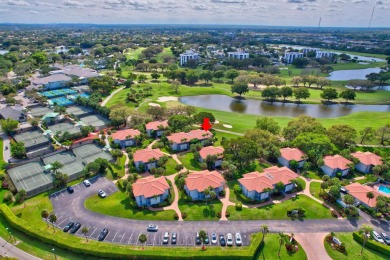 LIVE THE BOCA WEST LIFESTYLE. Second Floor garden apartment with on Boca West Golf and Country Club in Florida - for sale on GolfHomes.com, golf home, golf lot