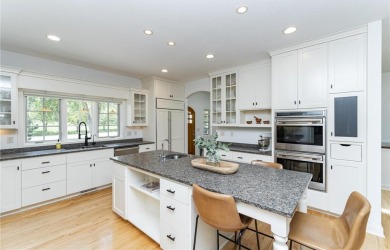 Absolutely stunning ranch-style home with luxury upgrades and on Rochester Golf and Country Club in Minnesota - for sale on GolfHomes.com, golf home, golf lot