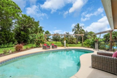This 3 bedroom with 2 full bathroom CBS pool home is located on on Evergreen Club in Florida - for sale on GolfHomes.com, golf home, golf lot
